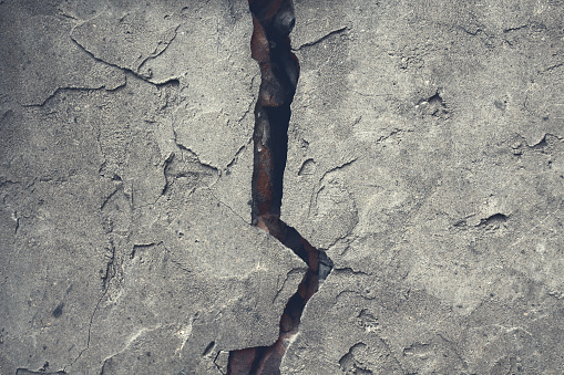Old cracked concrete wall. Close-up. Background. Texture.