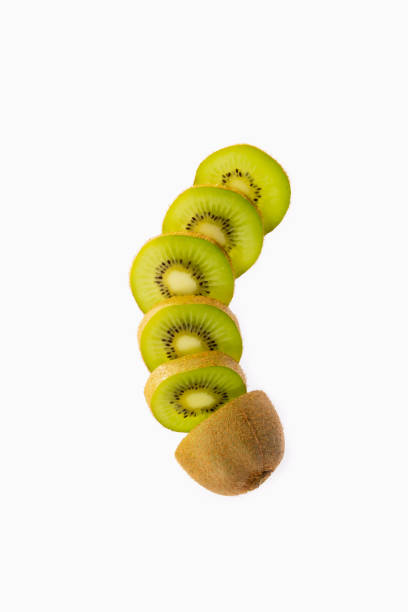 istock Close up of a sliced kiwi falling 1367655738