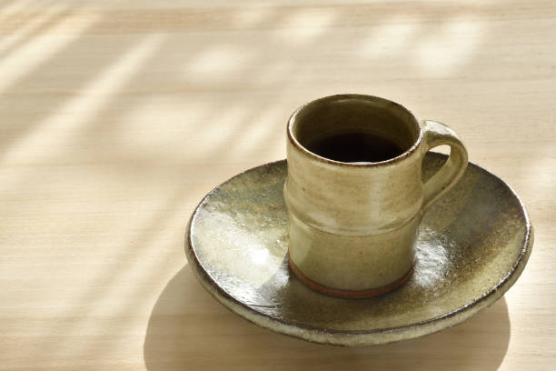 istock A cup of coffee on a wooden table 1367657053