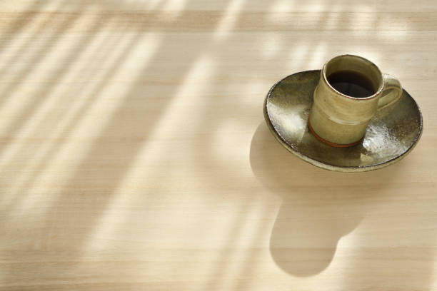 istock A cup of coffee on a wooden table 1367657061