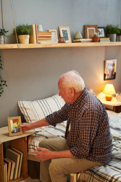 istock Senior man thinking about his family 1367657178
