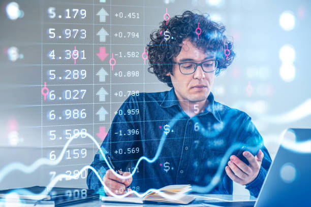 istock Curly serious businessman wearing jeans shirt is taking notes 1367660445