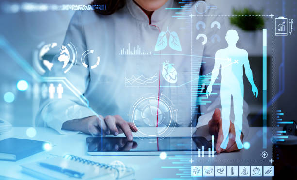 istock Female doctor wearing white suit is working on tablet 1367661934