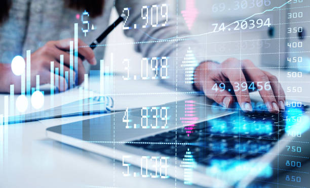 istock Businesswoman wearing white pullover is typing message on laptop 1367662641