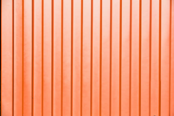 istock Striped wave steel metal sheet cargo container line industry wall texture pattern for background. box container striped line textured. container wall. 1367662736