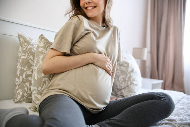 istock Happy pregnant woman 1367666476
