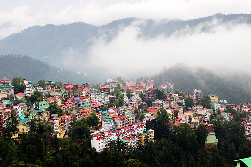 Village in mountain range elevated view.