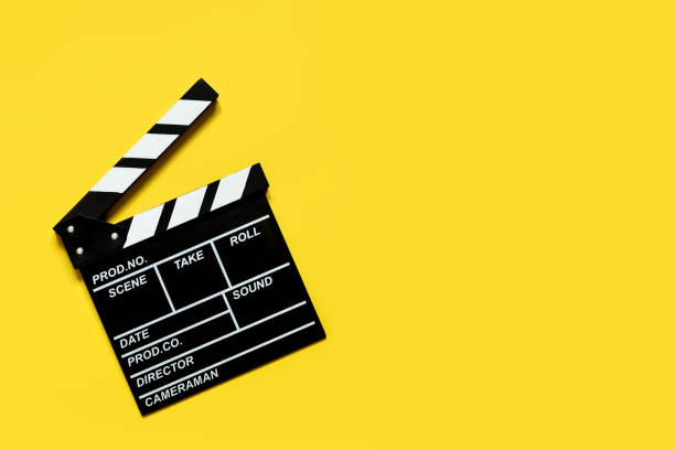 istock clapperboard for film shooting on a yellow background copy space 1367668843