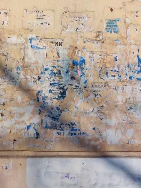 istock remnants of old advertising on the building wall 1367671659