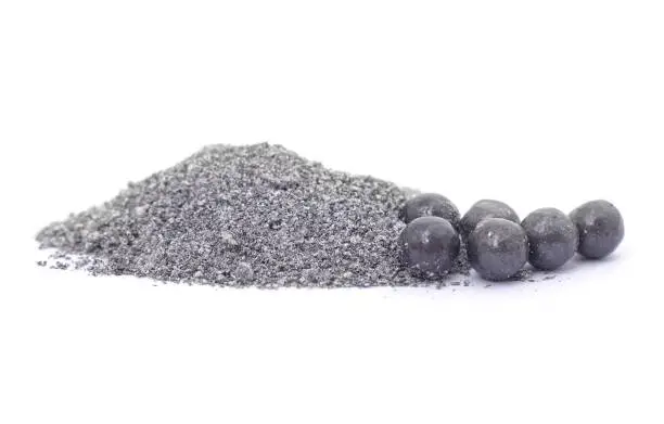 Pile of gunpowder and shot isolated on a white background.