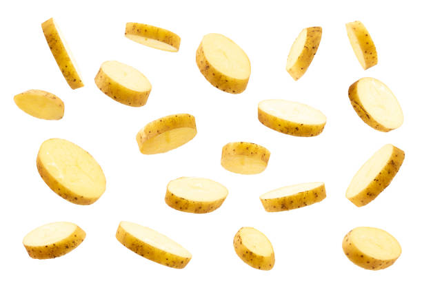 istock raw potatoes flying isolated on white 1367673453