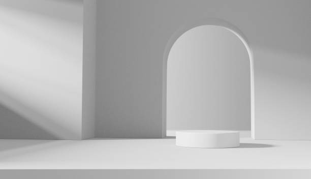 istock Empty white podium on white color background, Product Stand. 1367675045