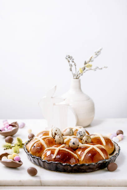 istock Homemade Easter traditional hot cross buns on ceramic dish 1367677856