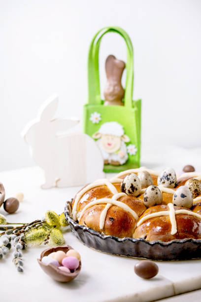 istock Homemade Easter traditional hot cross buns on ceramic dish 1367677857