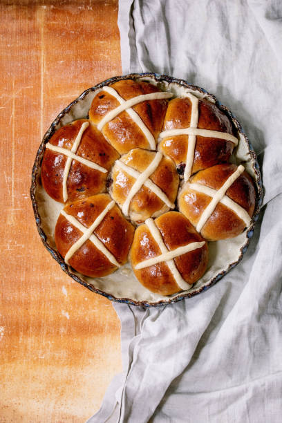 istock Homemade Easter traditional hot cross buns on ceramic dish 1367677862