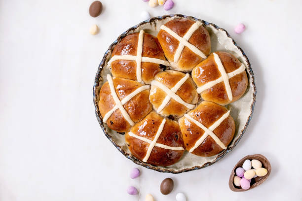 istock Homemade Easter traditional hot cross buns on ceramic dish 1367677868
