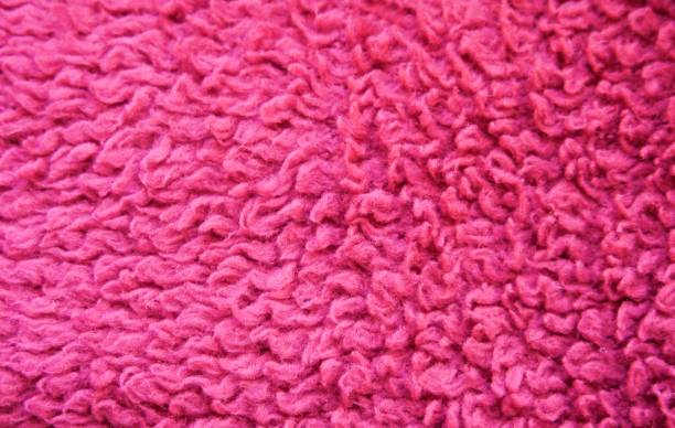 istock Pink fluffy wool blanket in close-up 1367679821