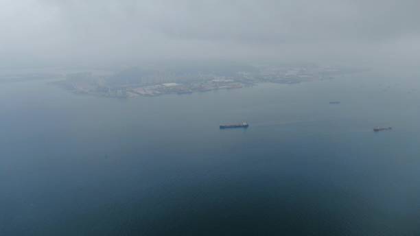 istock Islands and freighters in fog 1367680435