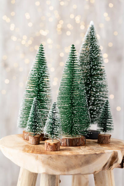 istock Christmas tree on bohek wooden, bokeh background. 1367680537