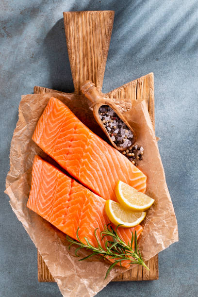 istock Fresh salmon steak with spinach and lentils. 1367680588