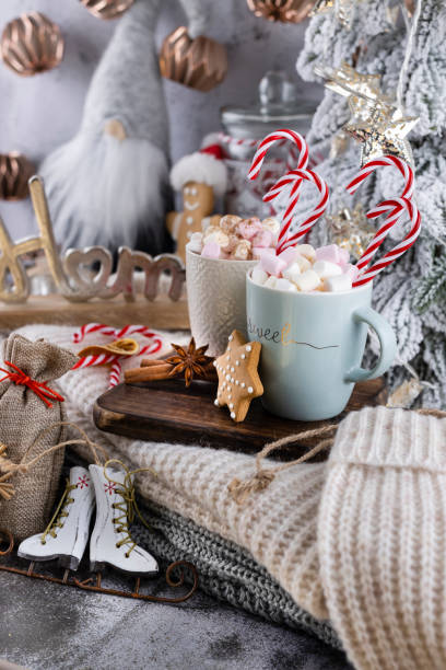 istock Gingerbread with mug of hot chocolate and candy cane. 1367680603