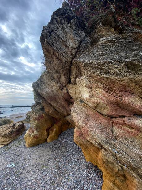 istock Seaview on gloomy day from rocky beach 1367682325