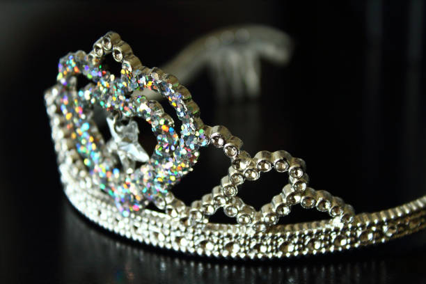 istock Beautiful bright children plastic crown. Close-up. Background. 1367682349