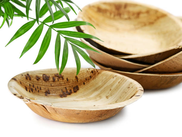 environmentally bowl made of Areca palm leaf on white background, eco-friendly plates made from palm tree waste environmentally bowl made of Areca palm leaf on white background, eco-friendly plates made from palm tree waste. areca stock pictures, royalty-free photos & images