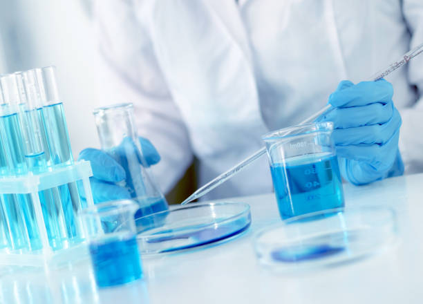 istock Scientist adds a laboratory pipette liquid to a petri dish, selective focus. Development of a vaccine for children against Covid-19 1367691801