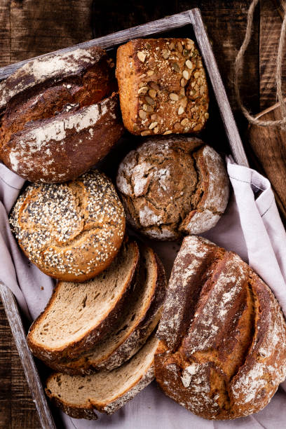 istock Sliced rye bread on cutting board, closeup.. 1367693291