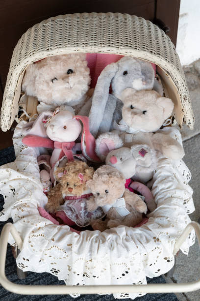 istock stuffed toys in the old fashioned buggy 1367693563