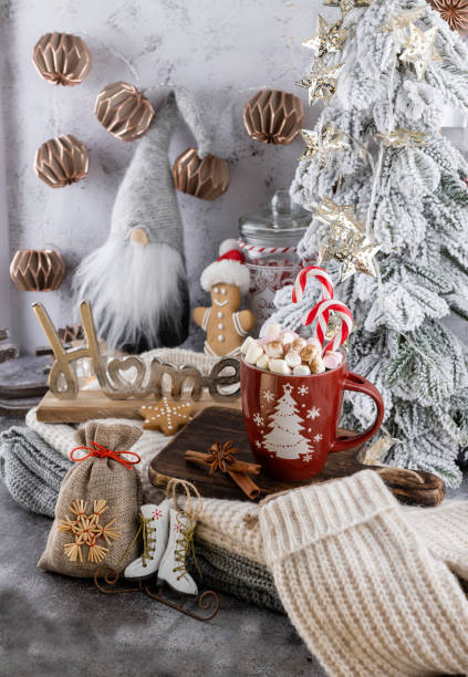 istock Gingerbread with mug of hot chocolate and candy cane. 1367693667