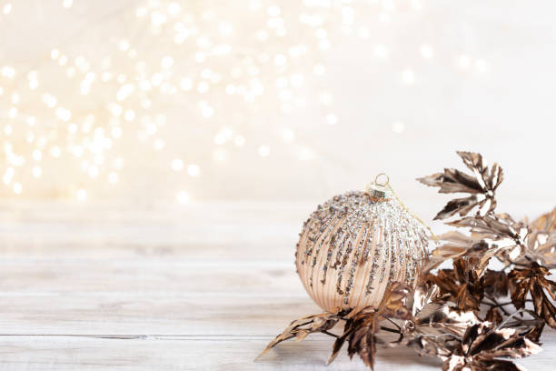 istock Golden christmas balls with bokeh. 1367693816