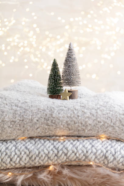istock Christmas little trees and golden lights bokeh. 1367694351