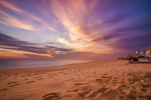 Faro Beach at sunset, Faro Island, Ria Formosa Natural Park, Faro, Algarve, Portugal