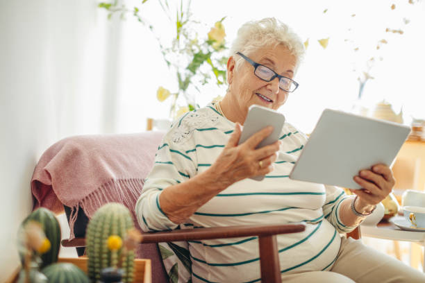 istock Senior woman at home 1367695650