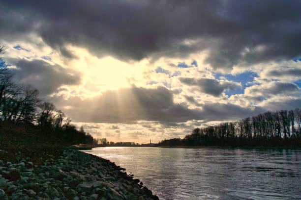 A View on Rhine river with dike in Speyer with rhine bridge in background