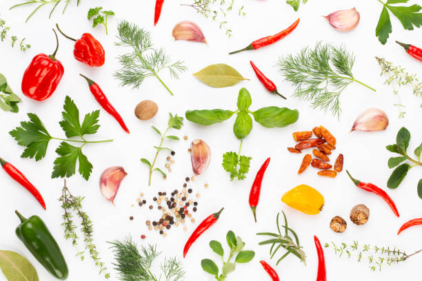 istock Spice herbal leaves and chili pepper on white background. Vegetables pattern. Floral and vegetables on white background. Top view, flat lay. 1367698509