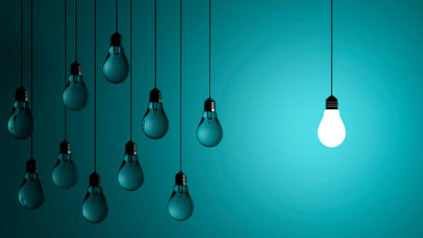 istock Light bulb idea. 3d render light bulb shines next to the extinguished ones. Leadership, inspiration, right decision and energy saving concept 1367699655