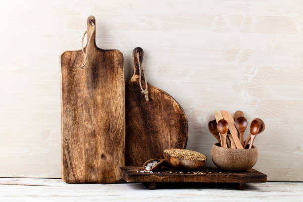 istock Interior design of gray kitchen wall with copper equipment and chopping board 1367699931