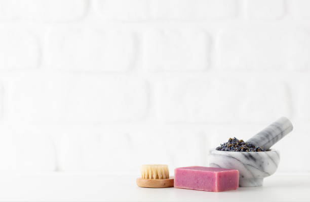istock Cosmetics bottles and natural handmade soap on white background 1367699994