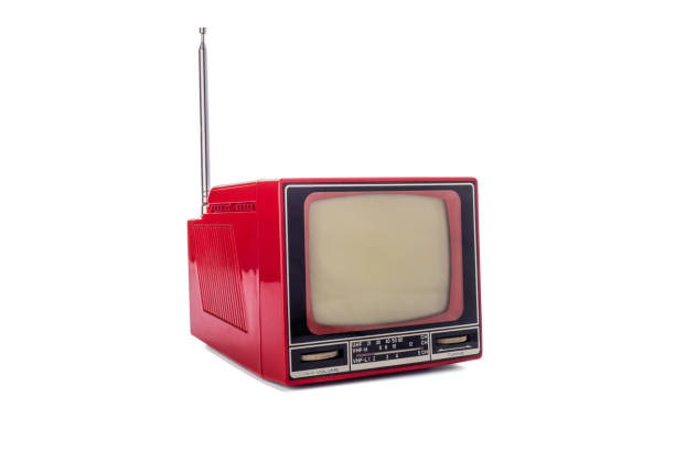 istock Old vintage portable TV set isolated on white background. Retro technology concept 1367700765