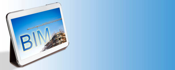 istock Planning a new architecture with BIM, Building Information Modeling system, a new way of architecture designing - Banner design concept with a digital tablet and copy space 1367701294