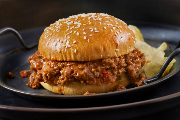 istock Sloppy Joe Burger on a Brioche Sesame Seed Bun with Potato Chips 1367701319