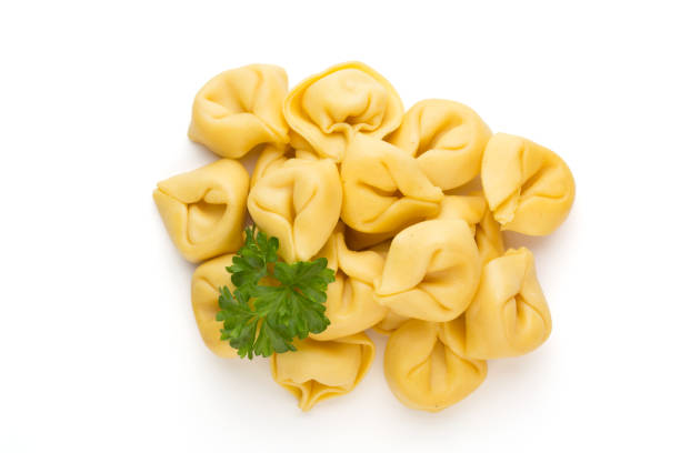 istock Raw homemade pasta,tortellini with herbs. 1367702173