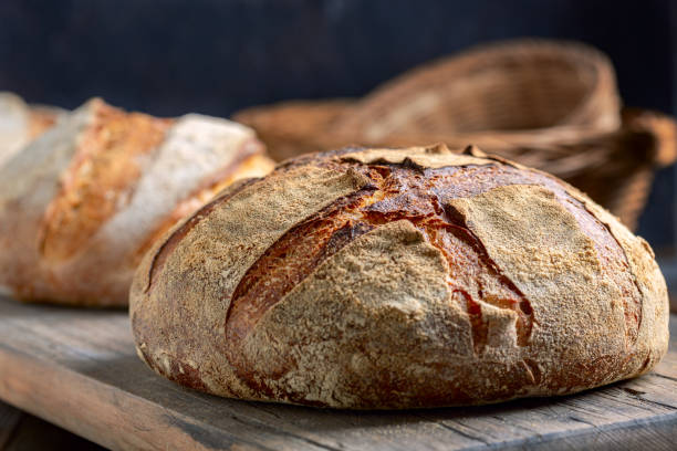 istock Handmade sourdough bread on a wooden shelf. 1367702815