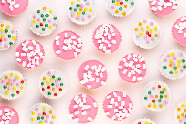 istock Colorful cupcakes on a white background. 1367703906