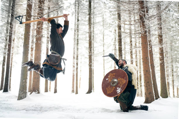 viking's helmet axe black shield and two spears isolated on white