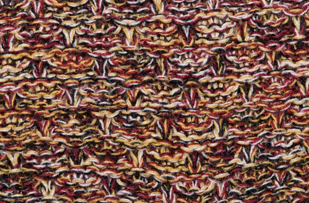 istock Wool knit color swatch sample pattern of several different colored woolen strands. 1367706351