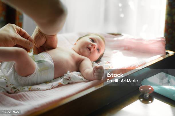 Father Changing Diaper To His Baby Girl Stock Photo - Download Image Now - Diaper, Changing Diaper, Change